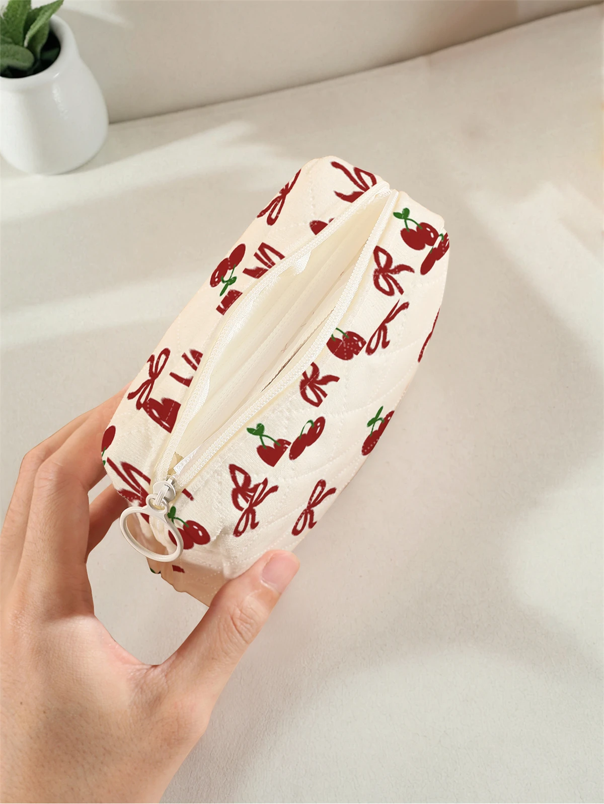 1 portable sanitary napkin storage bag with cherry bow pattern and diamond mesh material, lightweight women's tissue bag