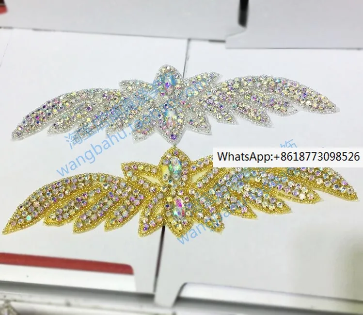 

Wing shaped AB colored rhinestone embellishment with golden diamond flower DIY snow boots, diamond patch dress, waist decoration