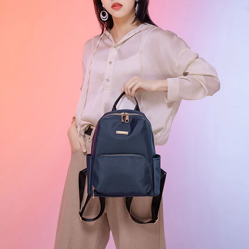 New women's bags women's bags trend Korean version of pure color simple and fashionable Oxford cloth ladies backpack