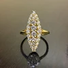 89997-aec011.jpg Huitan Hyperbole Marquise en forme de couleur or anneaux pour les femmes entièrement pavé éblouissant CZ nouveaux accessoires de bande de mariage à la mode bijoux