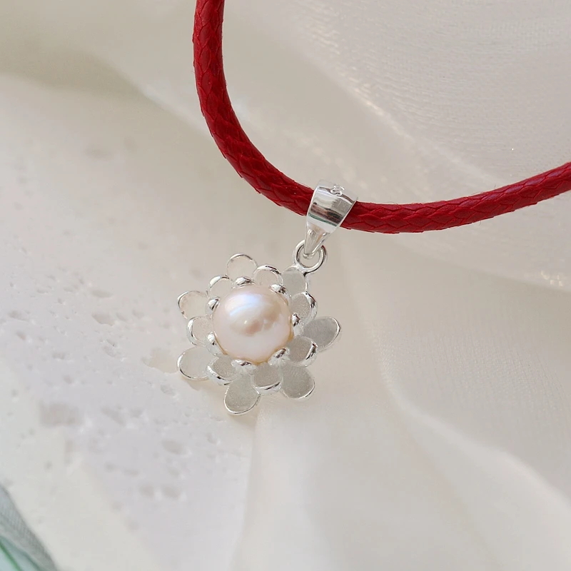 

Кулон из серебра 925 пробы с натуральным пресноводным жемчугом