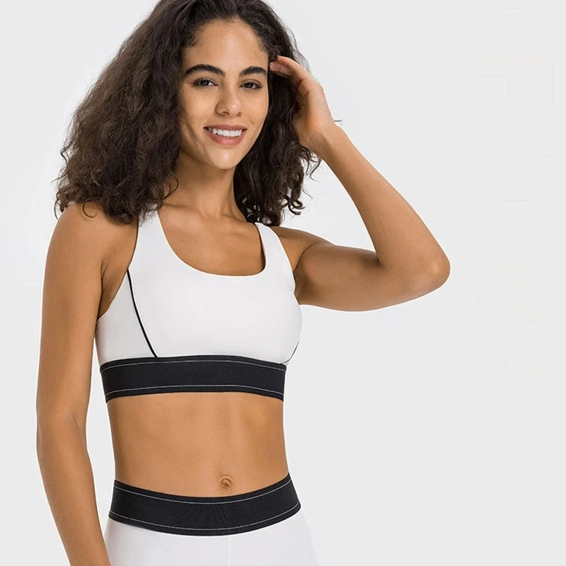 Contrasterende kleur gepersonaliseerde sportbeha met hoge sterkte en verstelbare schouderband Fiess hardloop-yogabeha Fiess broekset_voghion.com