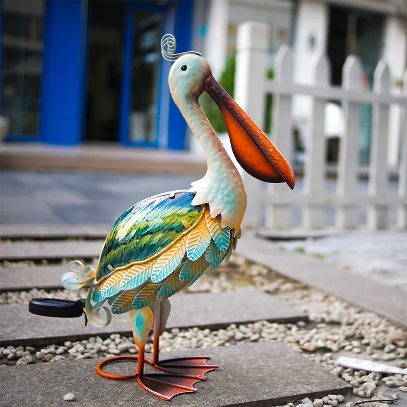 

Solar Pelican Garden Sculpture Outdoor decor Metal Pelican Art lawn adorns backyard porch patio