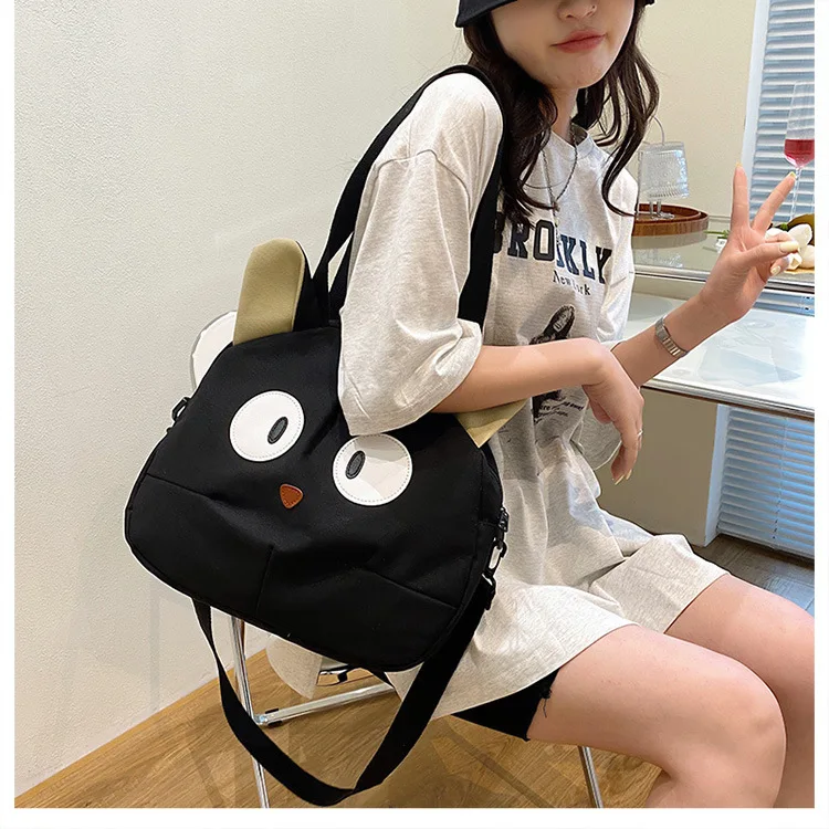 black color cat themed tote bags with big eyes