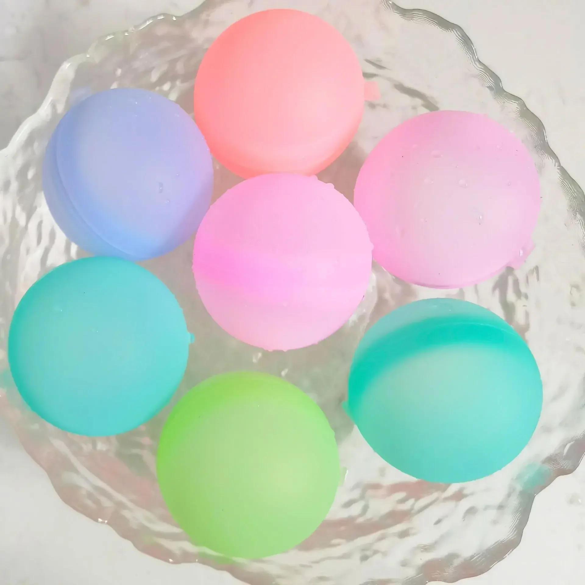 silicone water ball with water and reused for fights, children's toys, silicone magnets, popping balls.
