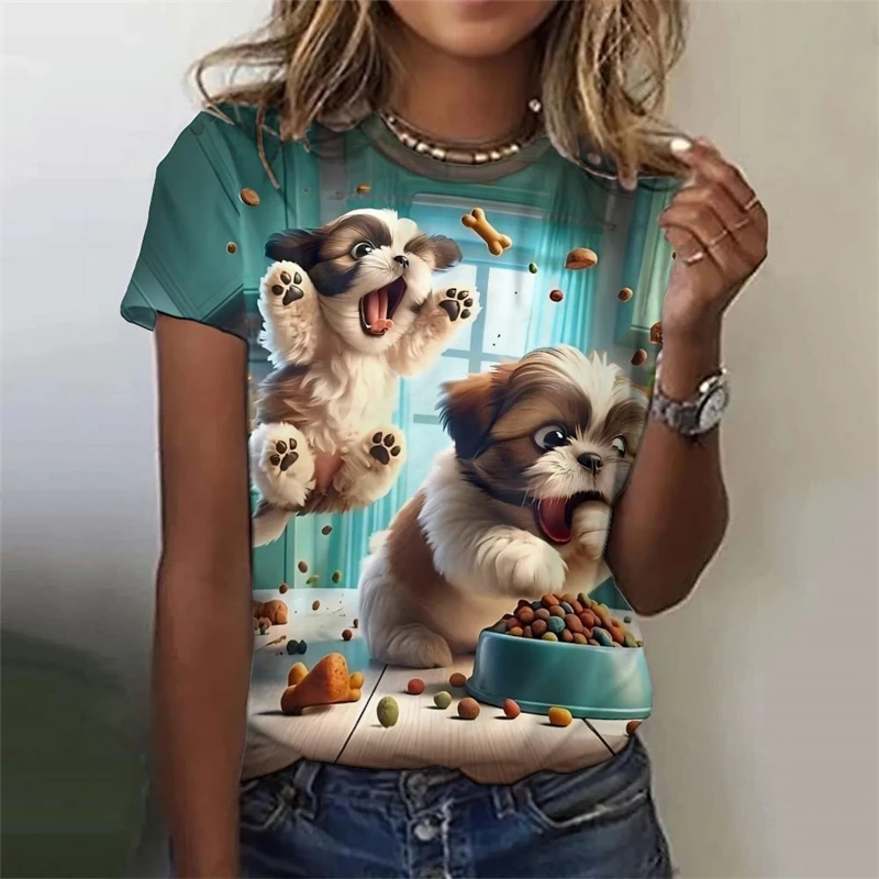 Woman wearing a casual cream-colored t-shirt with a realistic 3D print of two cute kittens sitting close together.