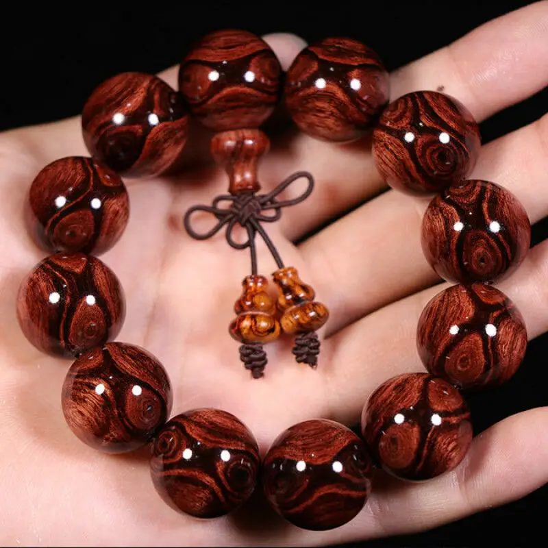 

Hainan Scented Rosewood Bracelet Ghost Face -to-Eye Persea Americana Old Materials Gall Tumor Scar Buddha Beads Sea Yellow Br