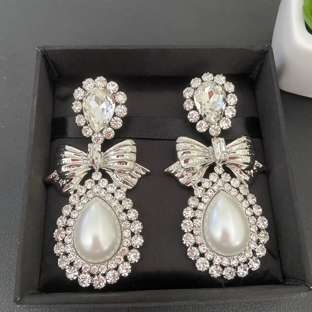 

Europe and the United States exaggerated temperament crystal drop pearl pendant heavy bow ear clip