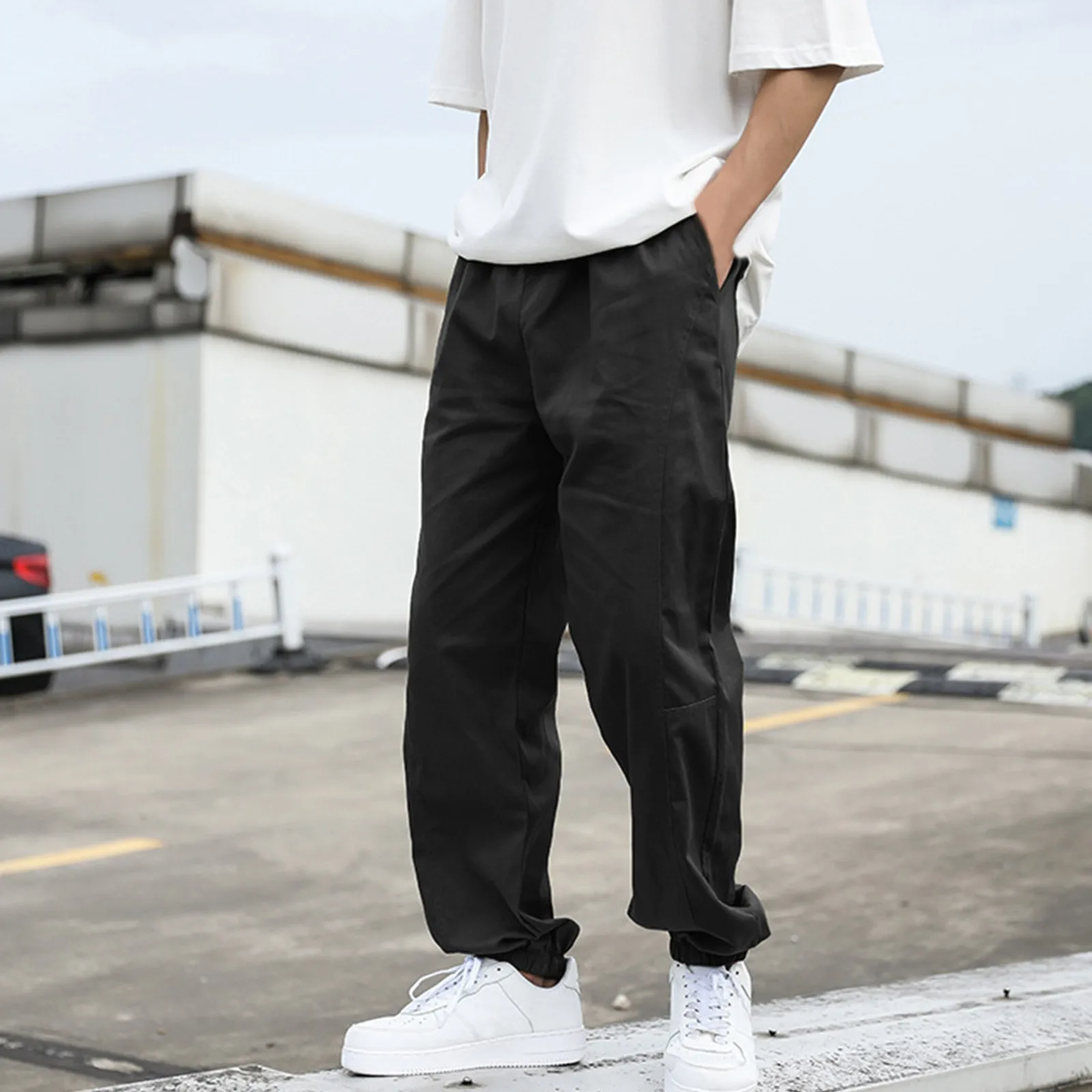 

Men's Casual Loose Solid Colour Trousers Drawstring Elastic Waisted Wide Leg Pants Solid Colour Versatile Trousers With Pockets