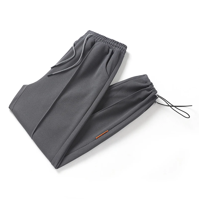 2024 New Korean Autumn Solid Men's Waffler Elastic Waist Drawstring Pocket Bound Feet Fashion Versatile Casual Loose Sweatpants