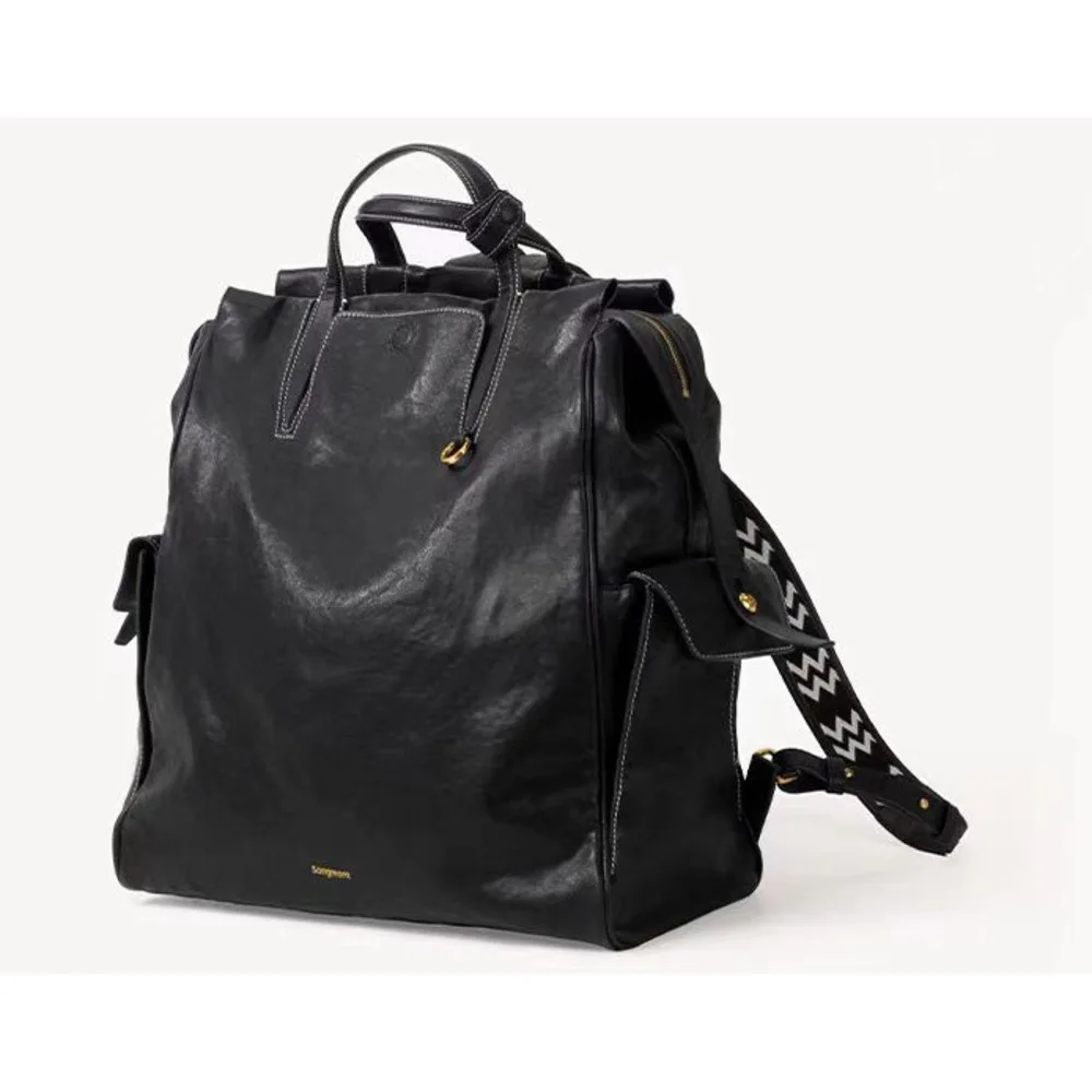 Unisex Leather Backpack Vegetable Tanned Leather Handbag_voghion.com