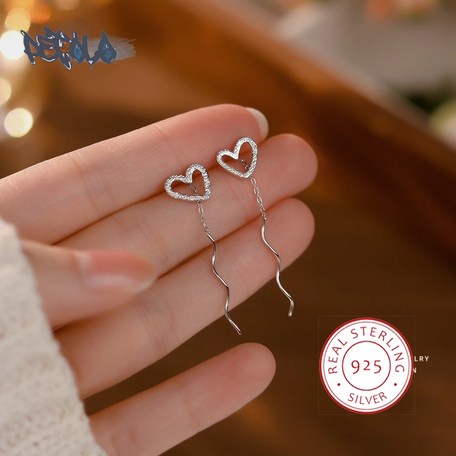 

Женские серьги из серебра пробы, с длинной бахромой
