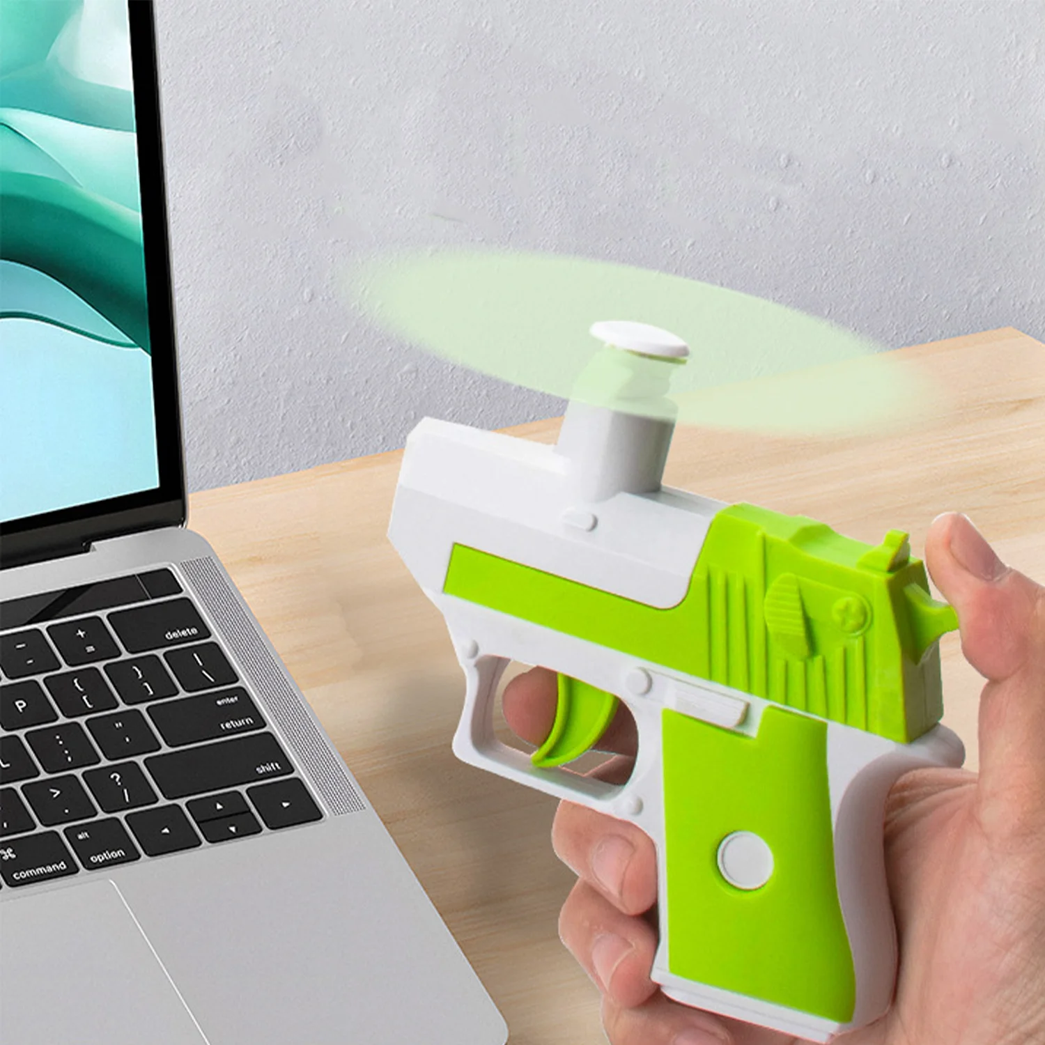 Fun decompression small fan carrot gun, mini creative manual portable handheld fan toy, decompression toy gun 4