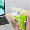 Fun decompression small fan carrot gun, mini creative manual portable handheld fan toy, decompression toy gun 4