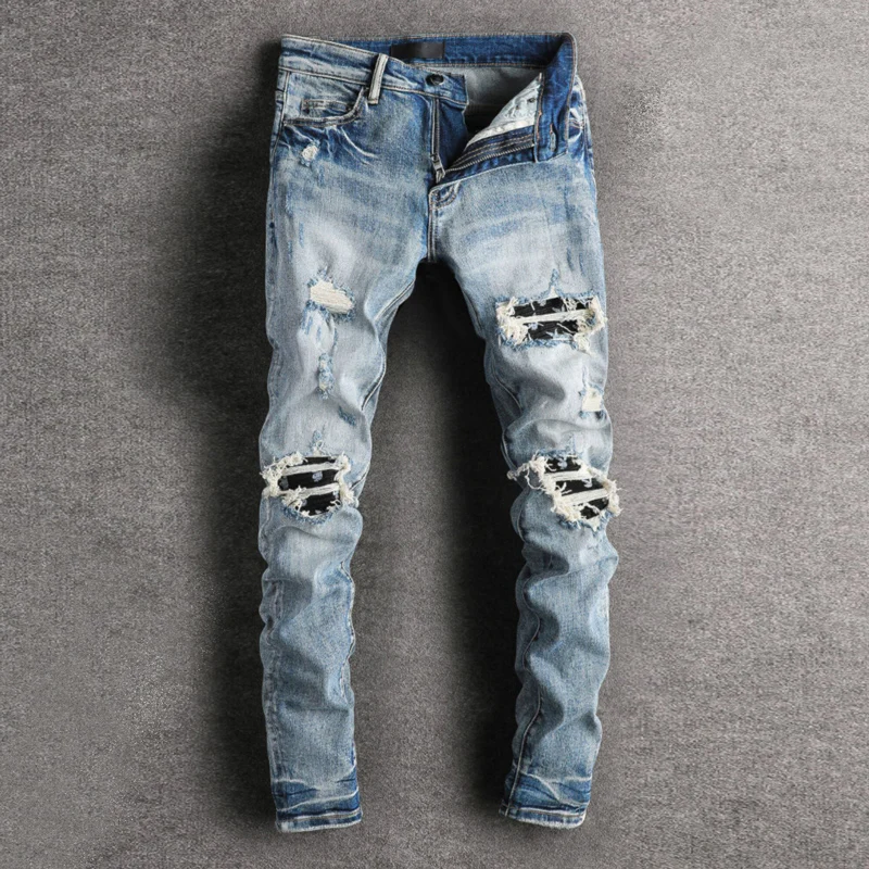 RIPPED JEANS WITH PATCHES - Light blue