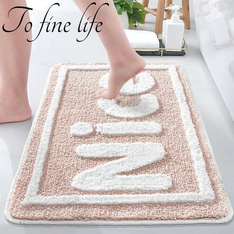 

50x80cm Household Bathroom Nice Plush Carpet Flocking Layering Thickened Non-slip Tufted Rug 2024 Absorbent and Quick-drying Mat