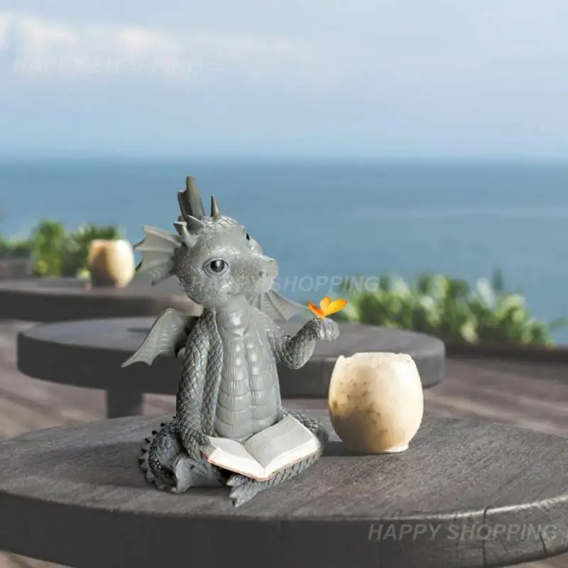 

Cute Little Dragon Dinosaur Meditation Reading Book Sculpture Figure Garden Home Decoration Resin Ornament Outdoor Decor