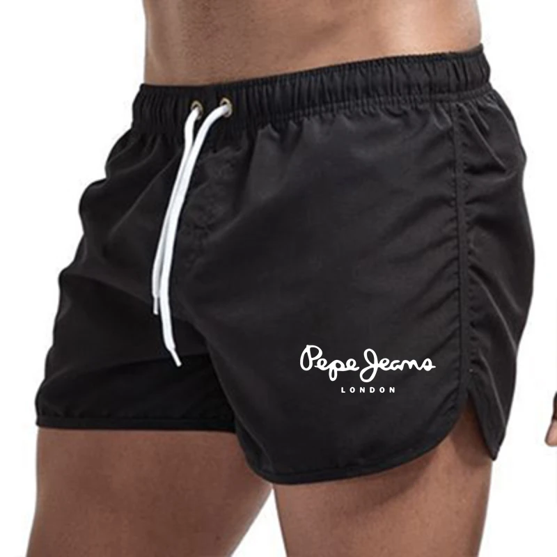 2024 New Summer Men's Leisure Sports Outdoor Shorts Breathable Leisure Running Fitness Triple Pants Beach Shorts