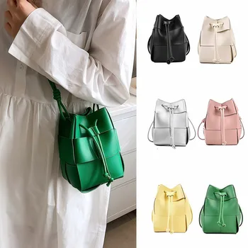 Drawstring woven bucket bag, niche design woven bag, large capacity mobile phone bag, single shoulder crossbody bag.   zwq 1