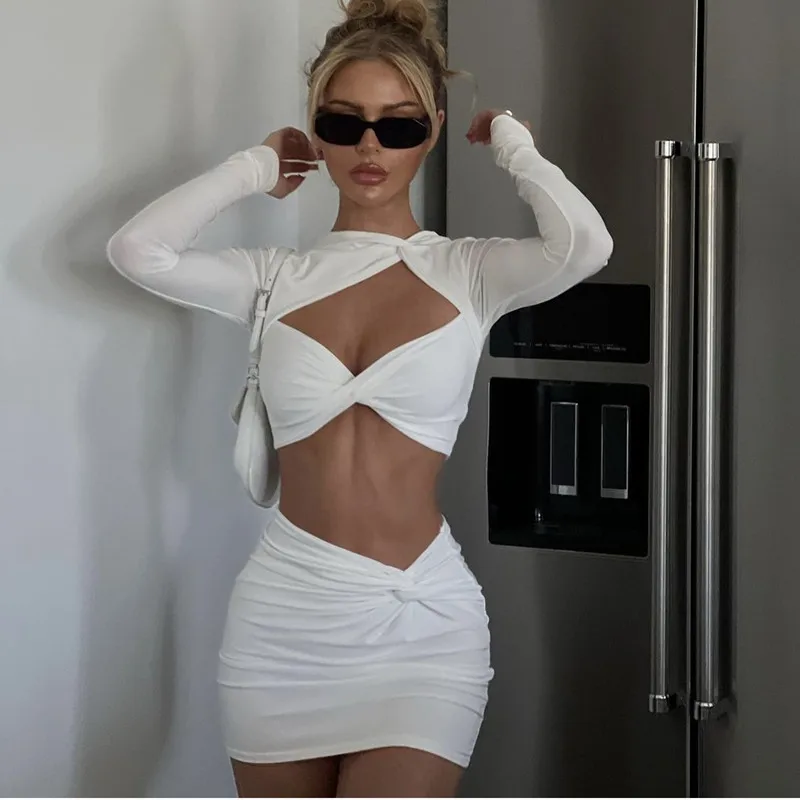 spring and autumn new fashion women's two-piece set hollowed-out waist sexy long-sleeved T-shirt short skirt set for women