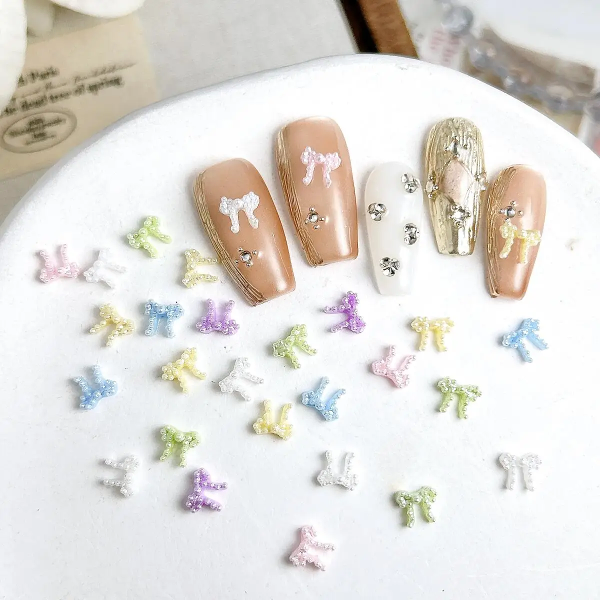 100개 마카롱 미니 펄 리본 레진 네일 참 장식, 창의적인 스위트 라인 리본 매듭 네일 아트 장식, DIY 요정 네일 부품
