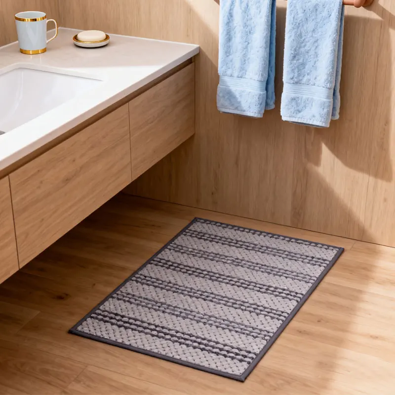 Soft plush microfiber bathroom rug with non-slip backing and quick-dry absorbent mat.
