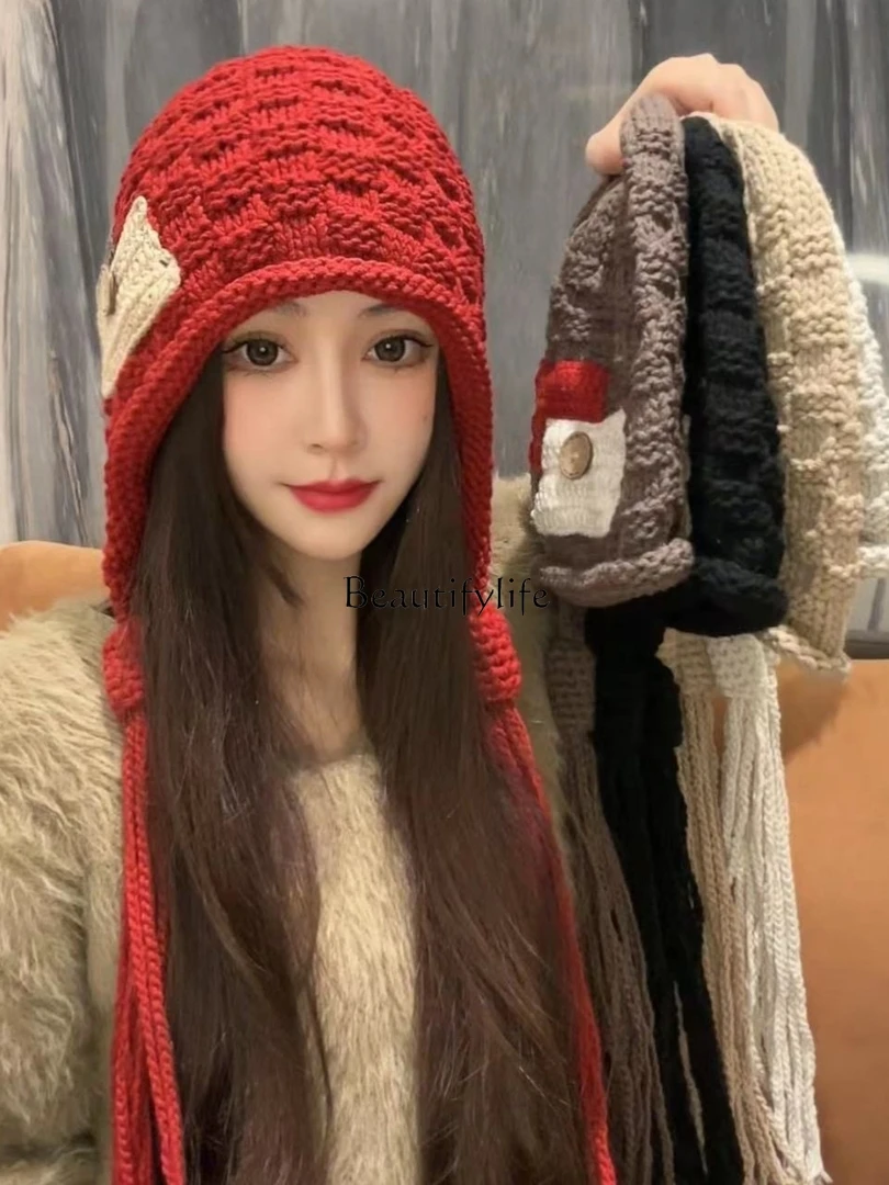 

Winter Warm Button Tassel Bag Cap Female Fashion Sweet Embroidered Earflaps Lei Feng Hat