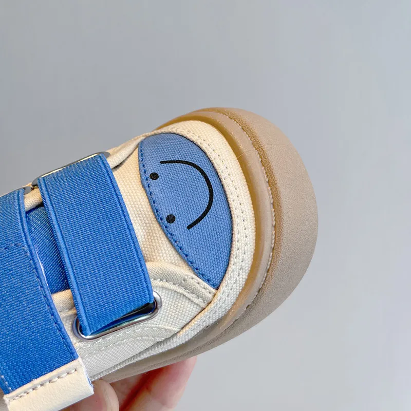 Early autumn new children's fashion cartoon smiling face simple Canvas Shoes Boys' girls' School comfortable casual shoes