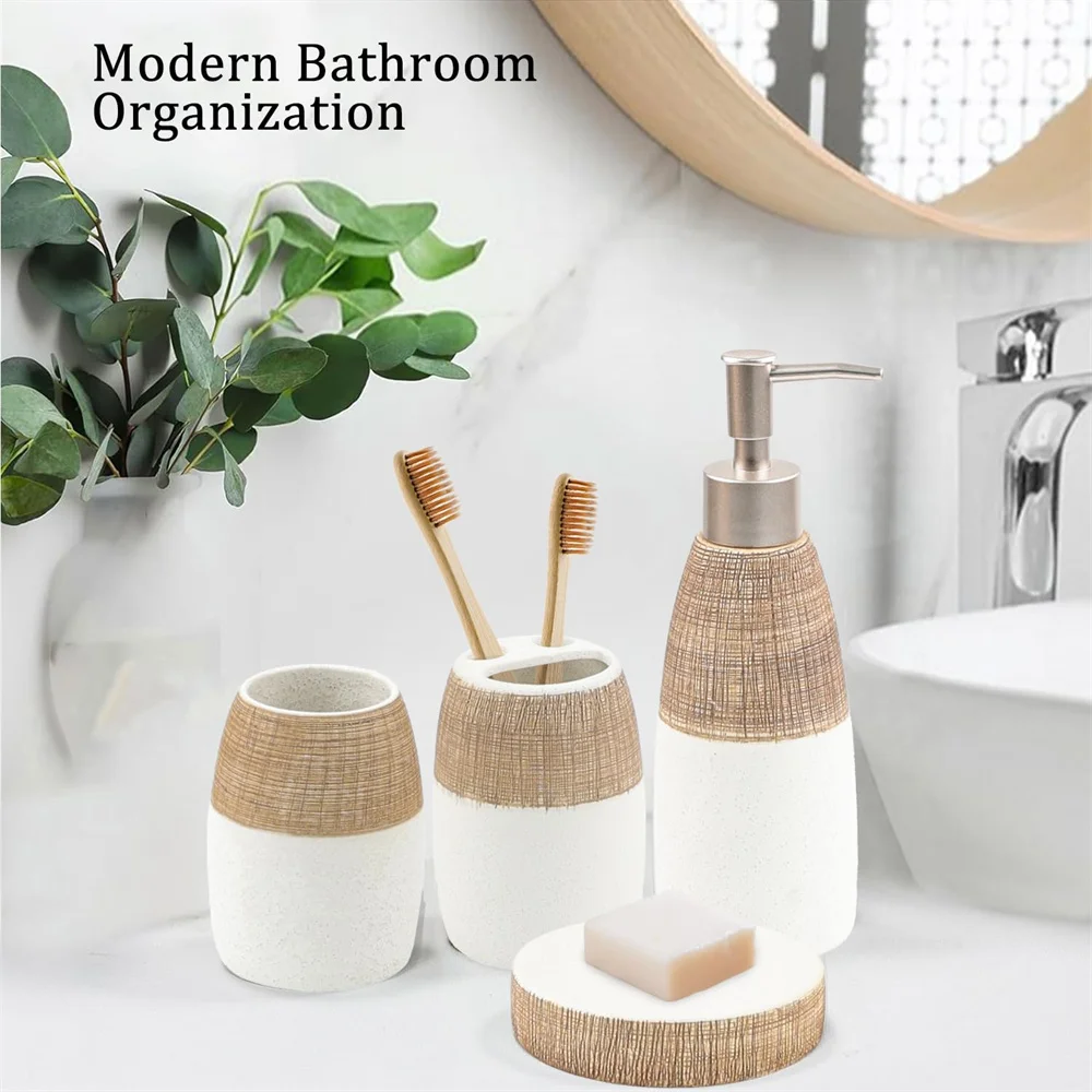 Ceramic bathroom set in brown and white: toothbrush holder, cup, and soap dish on a counter.