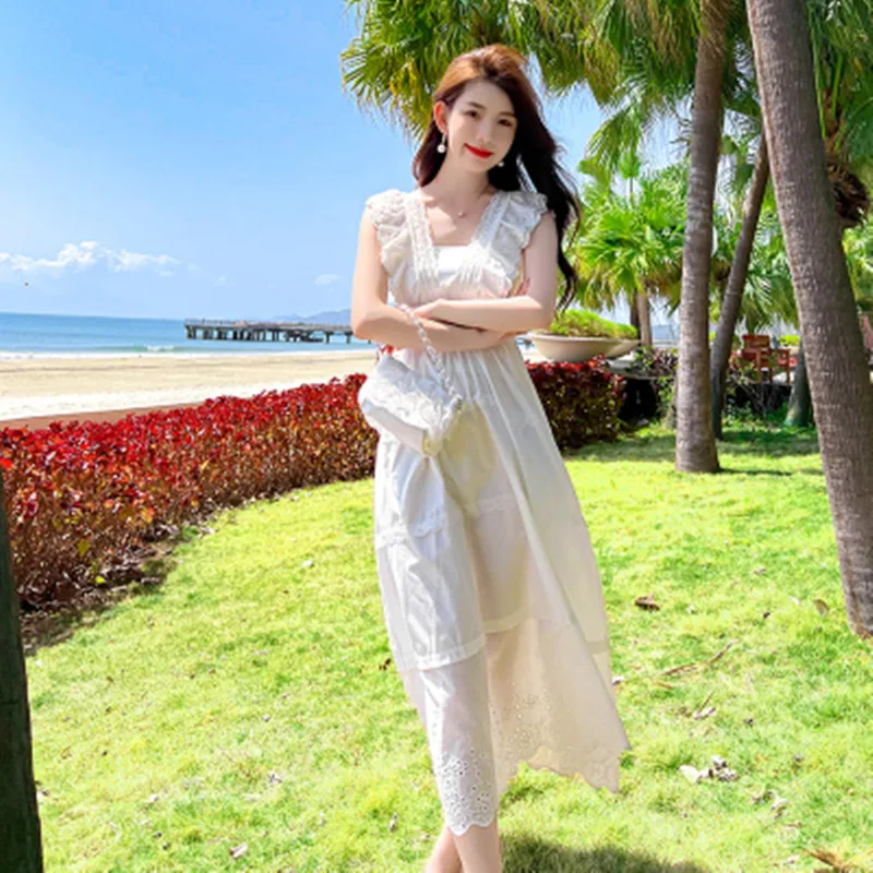 

Summer White Sleeveless V-neck Lace Hollow Out Chic Dress Women 2022 New Fasion Runway French Design Vacation Dress