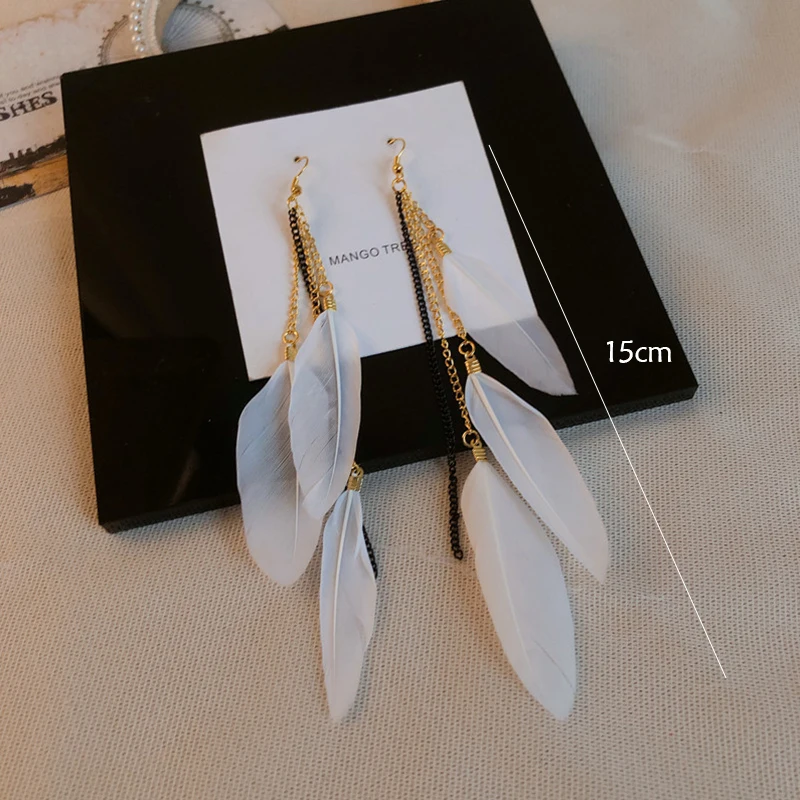 Jumwrit Feather Ear Cuff Earrings Tassel Feather Dangle Drop Long Chain  Earrings Beaded Ear Crawler …See more Jumwrit Feather Ear Cuff Earrings  Tassel