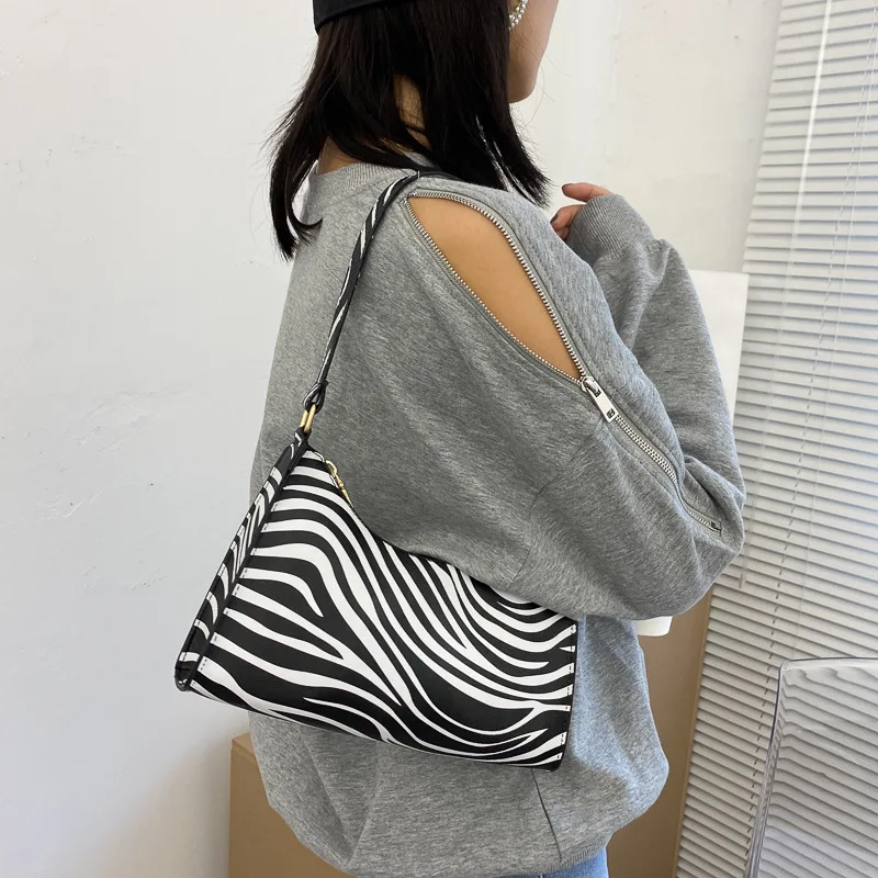 Fashion-Zebra-Print-Women-Luxury-Handbag-PU-Leather-Simple-Underarm-Shoulder-Bags-Female-Daily-Design-Totes.jpg Fashion Zebra Print Women Luxury Handbag PU Leather Simple Underarm Shoulder Bags Female Daily Design Totes