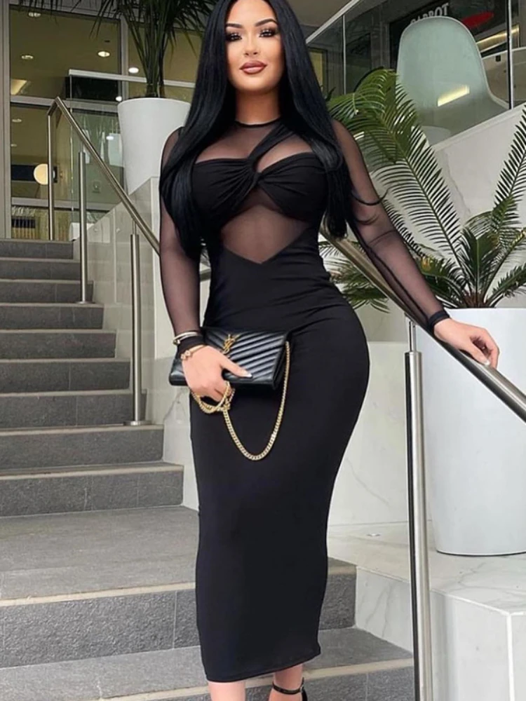 

Women's 2023 New Round Neck Mesh Spliced Solid Color Long Sleeve Medium Length Tight Dress