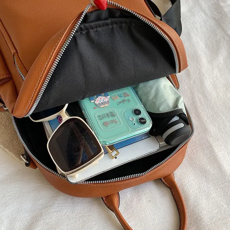 Рисунок 6 - Женская сумка, многофункциональные сумки через плечо