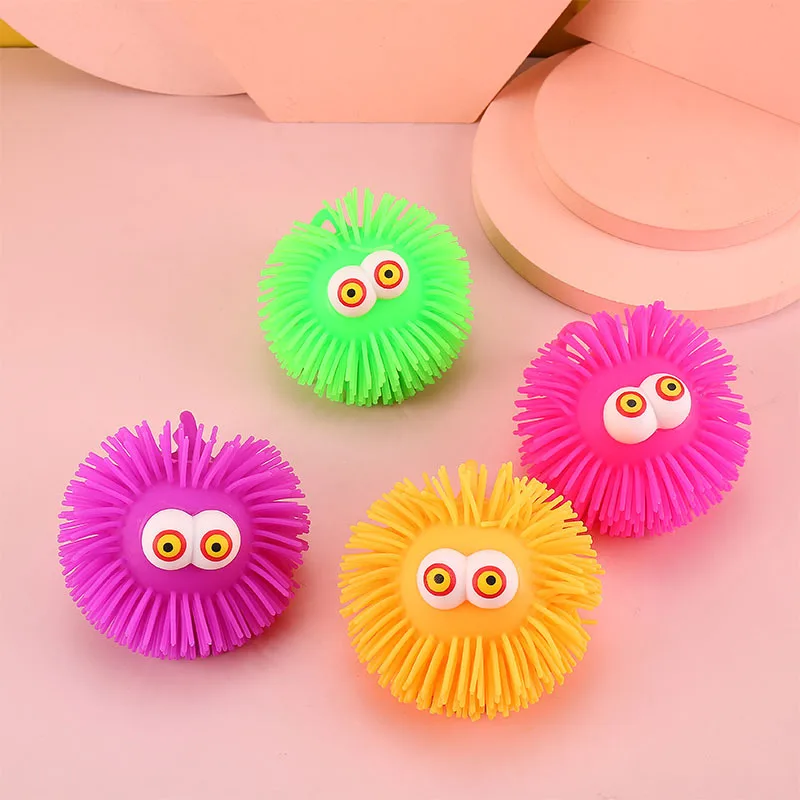 

Creative Cartoon Protruding Eye Hair Flash Elastic Ball Kneading Music Children's Soft Glue Decompression Venting Toy Wholesale
