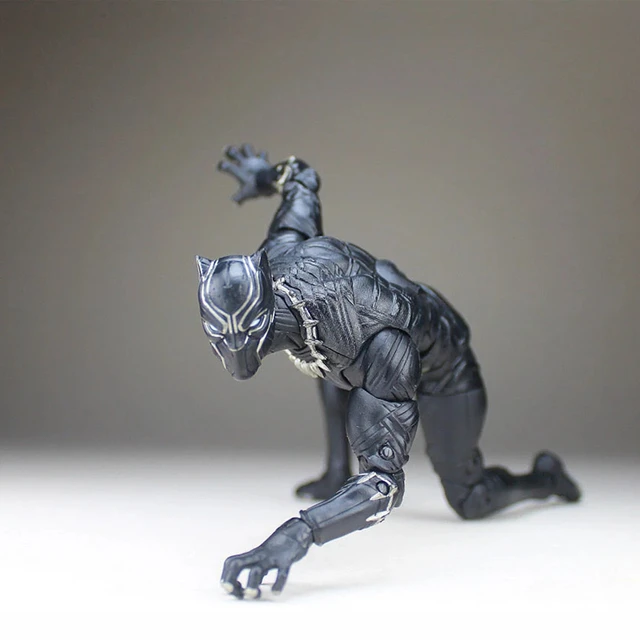 Full body photo of the marvel's the black panther in an action pose but use  only silver colors and make it marvel's the silver panther. #getty images  on Craiyon