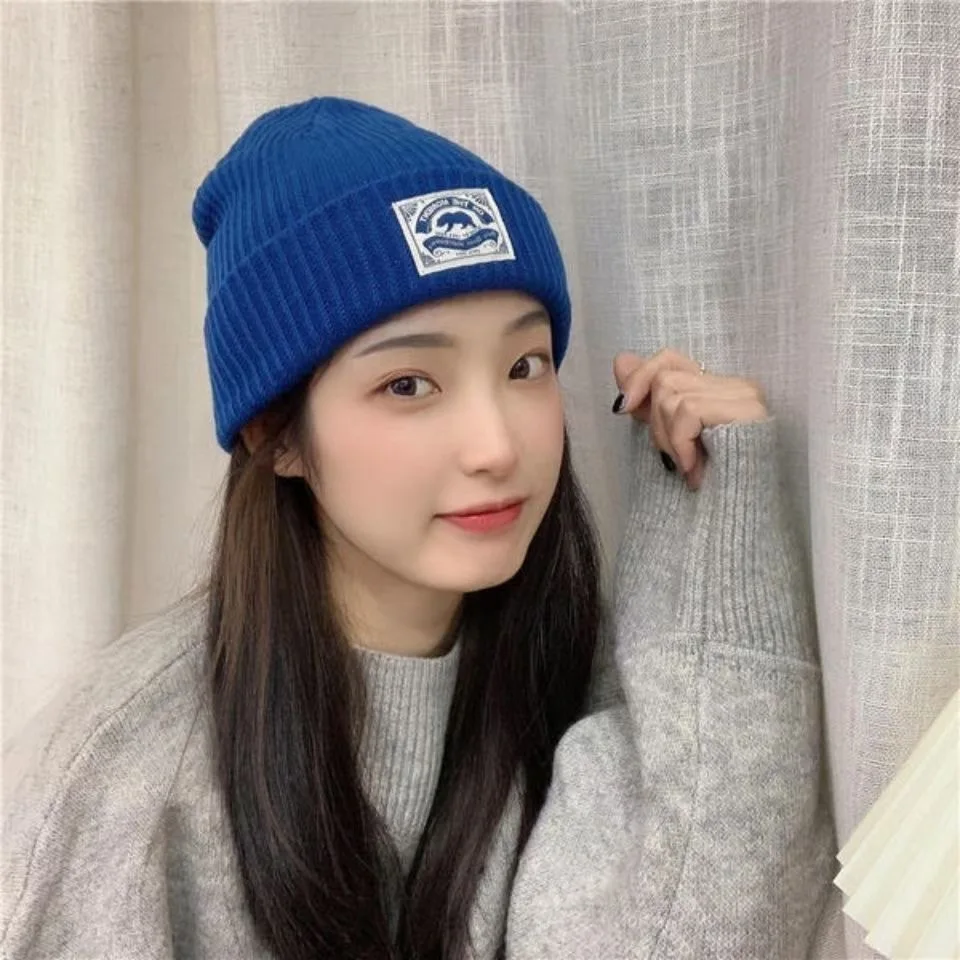 

Hat Women's Autumn and Winter Woolen Hat Solid Color Cold Hat Korean version of the lovely warm cap couple knitted cap