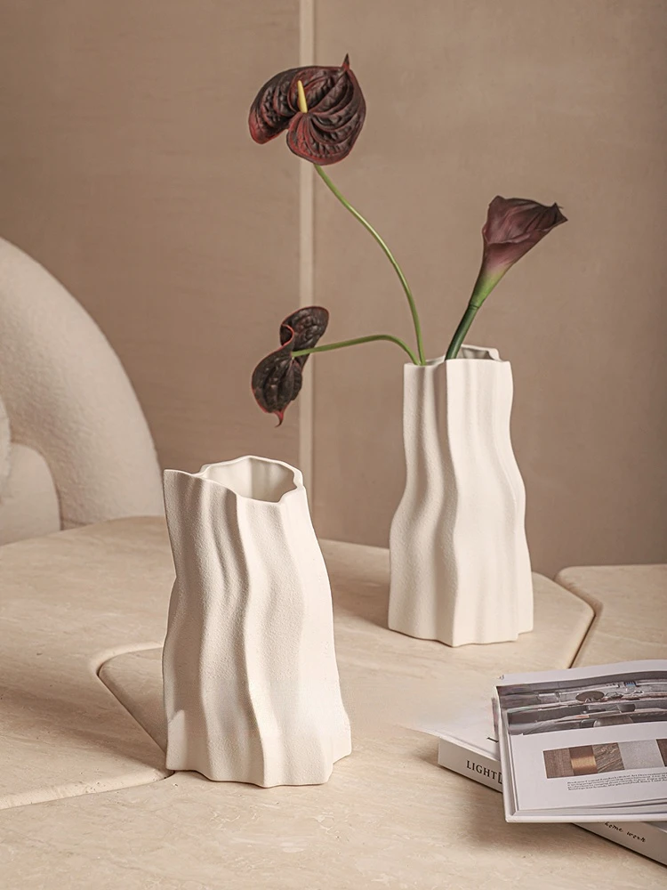 

Simple and abstract model room, white ceramic flower decorations, living room, porch, flower art, vase, home