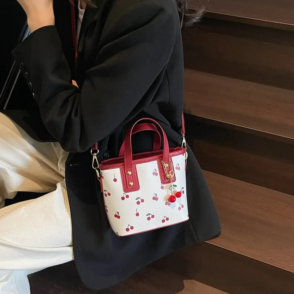 Women PU Cherry Shoulder Bag Large Capacity Trendy Commuting Bag with Cherry Pendant Stylish Crossbody Bag Aesthetic Handbag