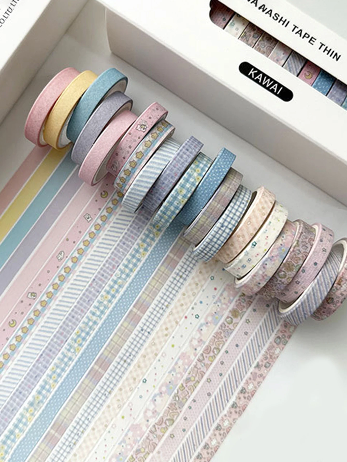 Washi tape rolls arranged for craft projects