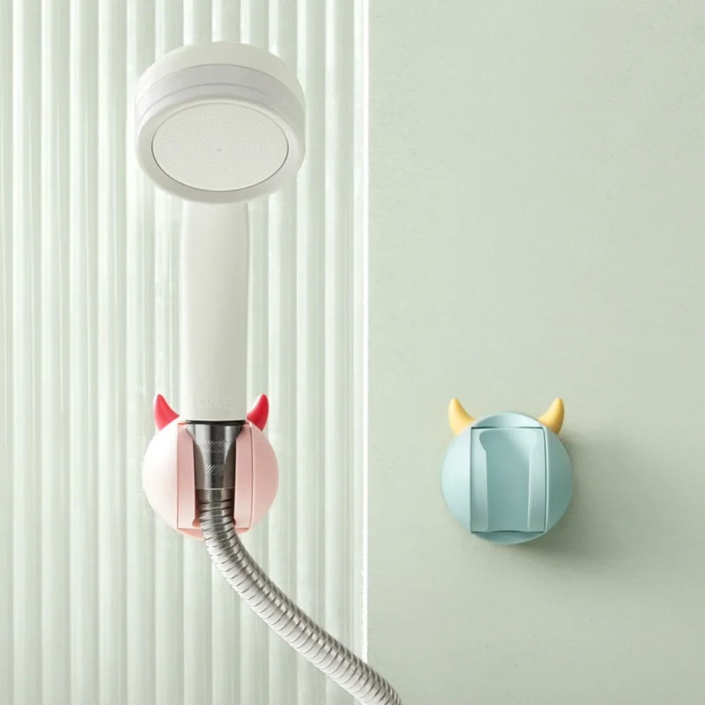 

Punch-free Shower Head Rack Adjustable Cute Shower Nozzle Hanger with Adhesive Back Stable Shower Head Holder
