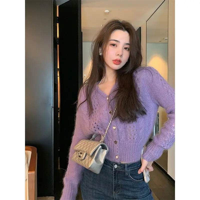 

2021 Autumn New Solid Color Long Sleeve Twist Hollowed Out Early Autumn New Knit Sweater Loose Sweater Coat Cardigan Woman