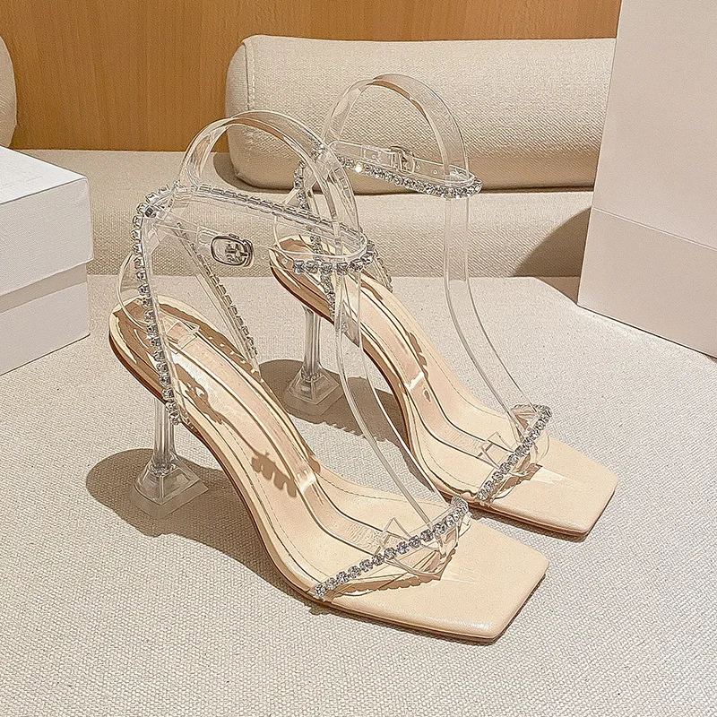

2023 New Summer Design Square Toe Woman Sandals Fashion Crystal Diamond Ankle Buckle Strap Transparent Strange Heels Shoes