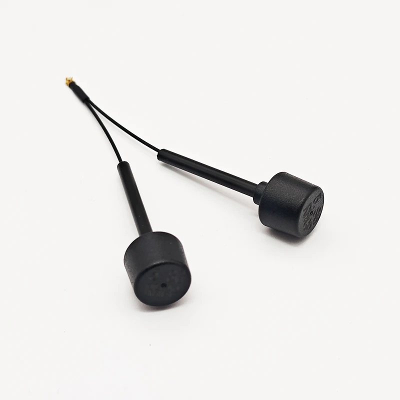 Antenne FPV 5.8GHz 3dBi LHCP ou RHCP pour Hélicoptère RC et Drone, posée sur fond blanc.
