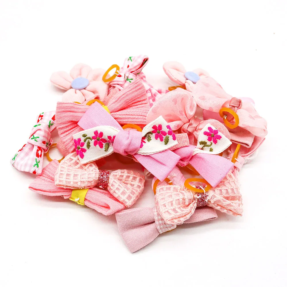 10pcs 핑크 스타일 개 Bowknot 고무 밴드와 작은 개 머리 활 고양이 개 머리 장식 애완 동물 미용 액세서리