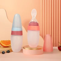 100ml Liquid Silicone Baby Feeder Rice Paste Fruit Puree Toddler Squeeze Feeding Bottle with Dispensing Spoon 1