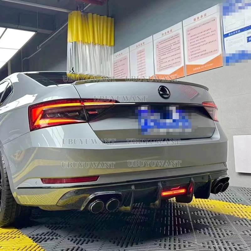 Фото Задняя губа из углеродного волокна с искусственными элементами для Skoda Superb 2015- 2023 ласты Акула стильный диффузор бампер ГУАР №5