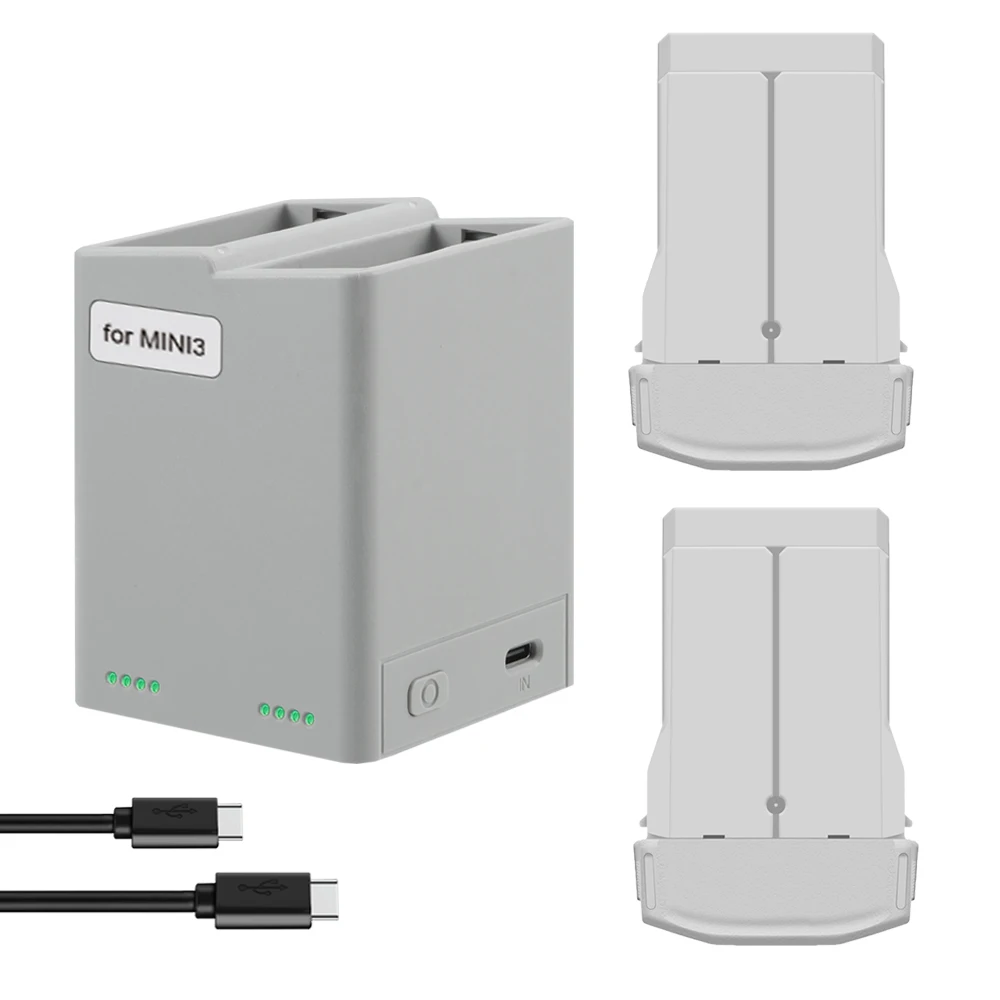 Quatre batteries de drone alignées, modèle compatible DJI, vue d'ensemble