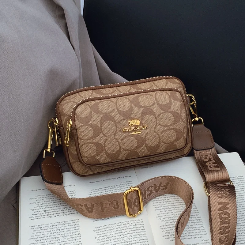 Original Circular-Pattern Logo Crossbody: Retro-luxury, durable fabric, adjustable strap. Ideal for daily/work/social use