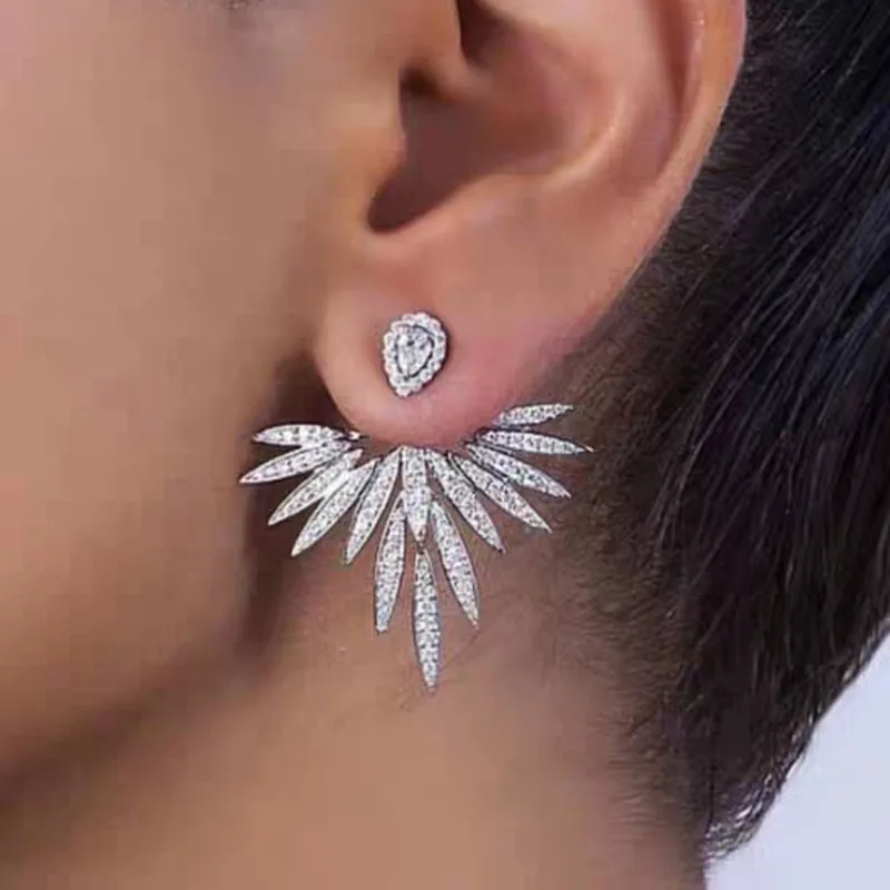 2315855-4fc453.jpg Sc6aa414a7d5747738cf4d96e84424e89i Koeran Fashion Luxury Crystal Wing Symmetrical Earrings Exquisite Silver Color Party Jewelry for Women Mallzona